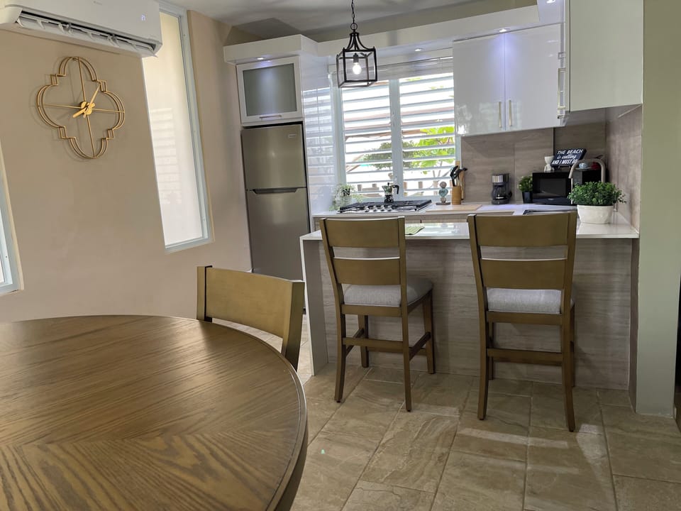 Unit 1: Kitchen with Open Concept Dinning Area