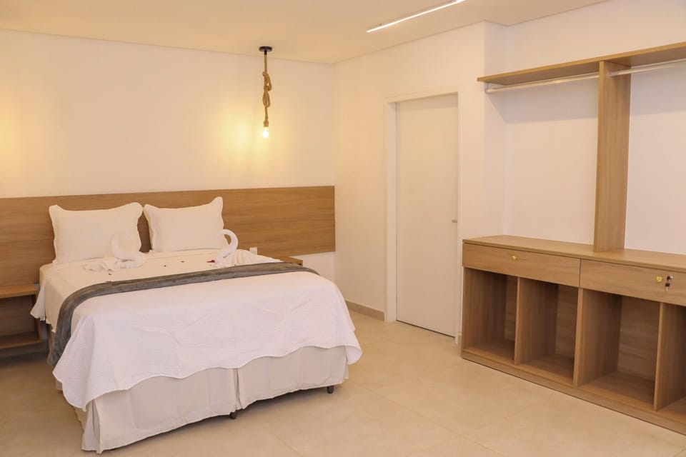 Deluxe Double Room, 1 Bedroom, Lanai, Garden View | Blackout drapes, iron/ironing board, free WiFi