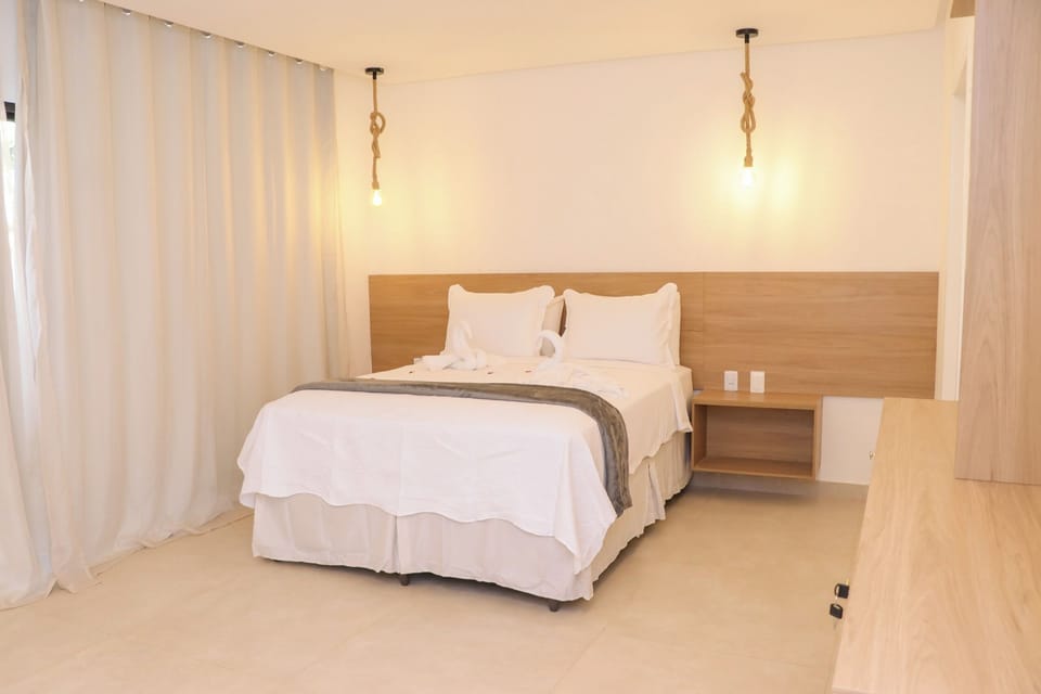 Deluxe Double Room, 1 Bedroom, Lanai, Garden View | Blackout drapes, iron/ironing board, free WiFi