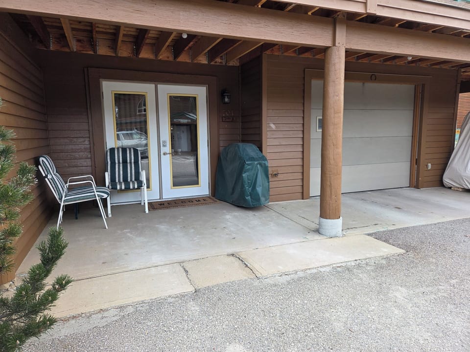 Guest Suite Patio and Owner Garage