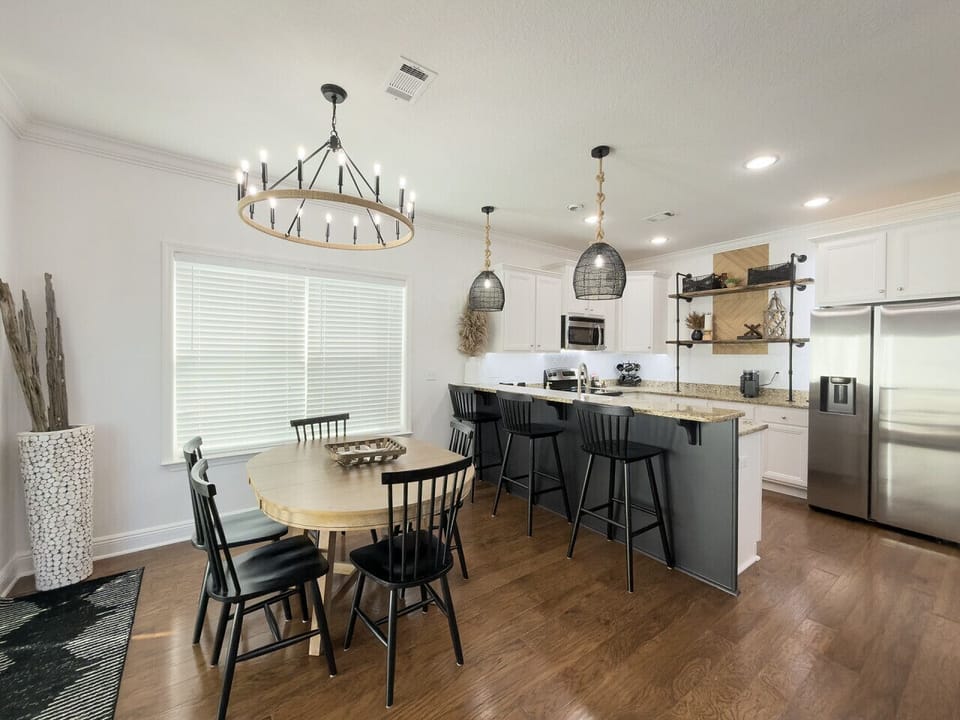 Dining area with extra seating at the bar for casual meals and gatherings