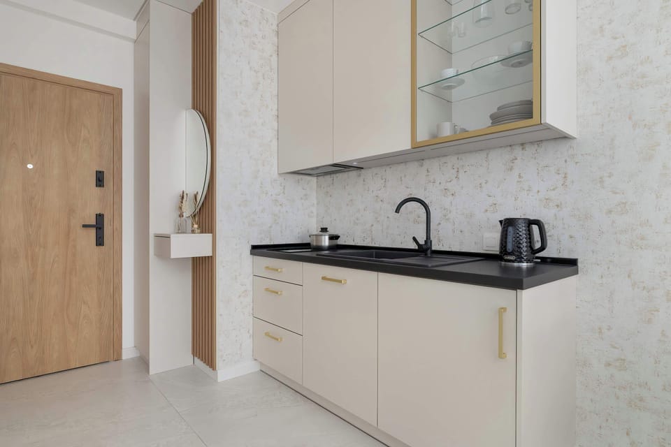 The fully equipped kitchenette includes everything you need for a home-cooked meal.