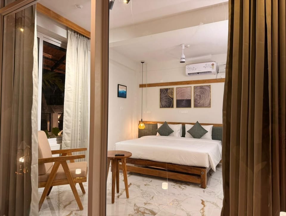 Deluxe Double Room, Garden View | Laptop workspace, iron/ironing board, free WiFi