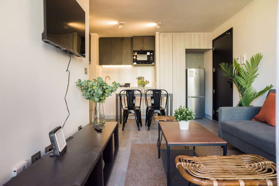 Stylish living space with modern amenities, perfect for unwinding after a day of city exploration.