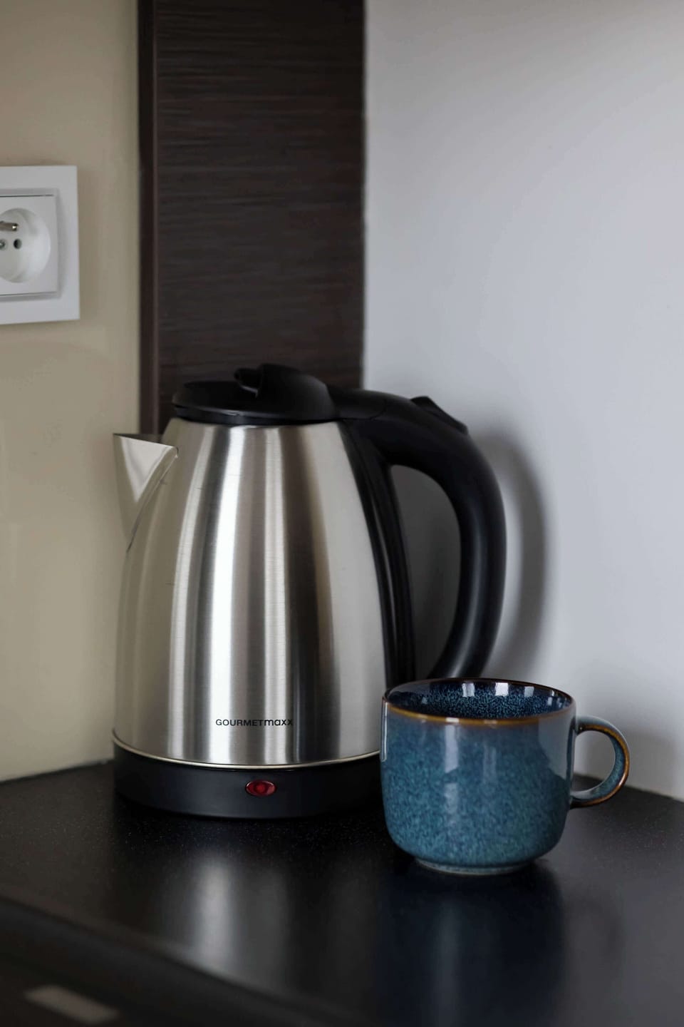 Electric kettle and coffee setup for guests.