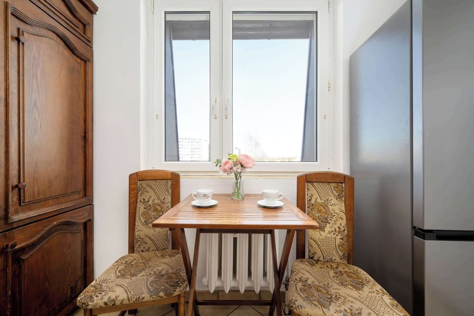 Small dining nook in the kitchen with window view