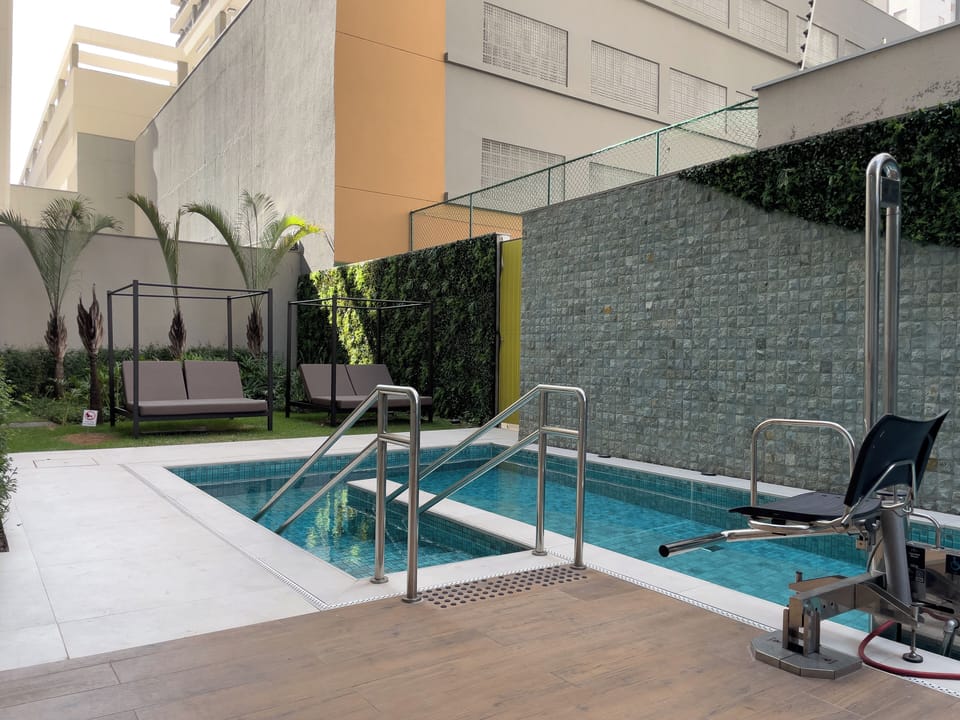 Outdoor pool, pool umbrellas, sun loungers