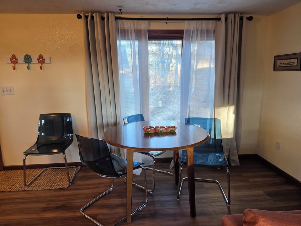 Enjoy the dining area looking out on the deck.