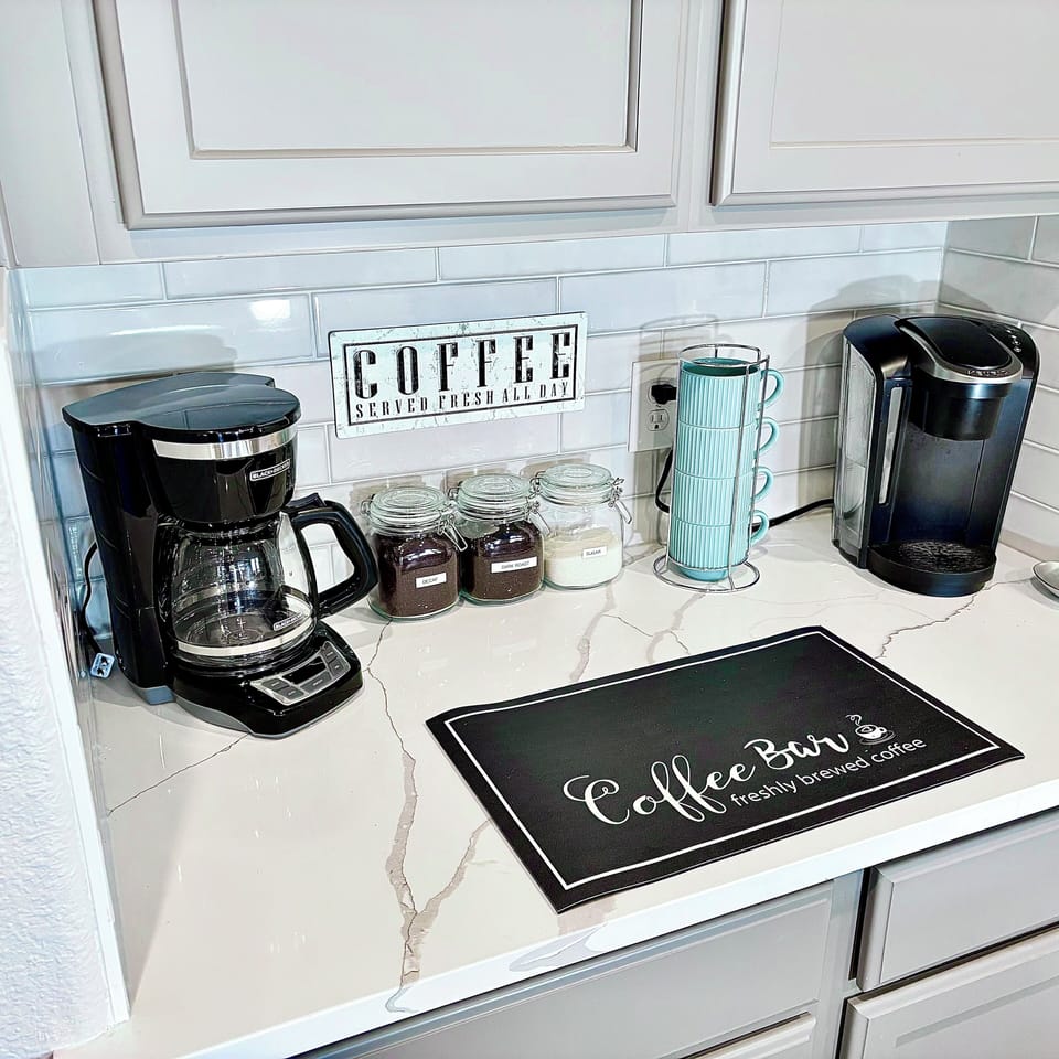 Fully stocked Coffee and Tea Bar.  Premium Dark Roast, Decaf, Teas, Cane Sugar
