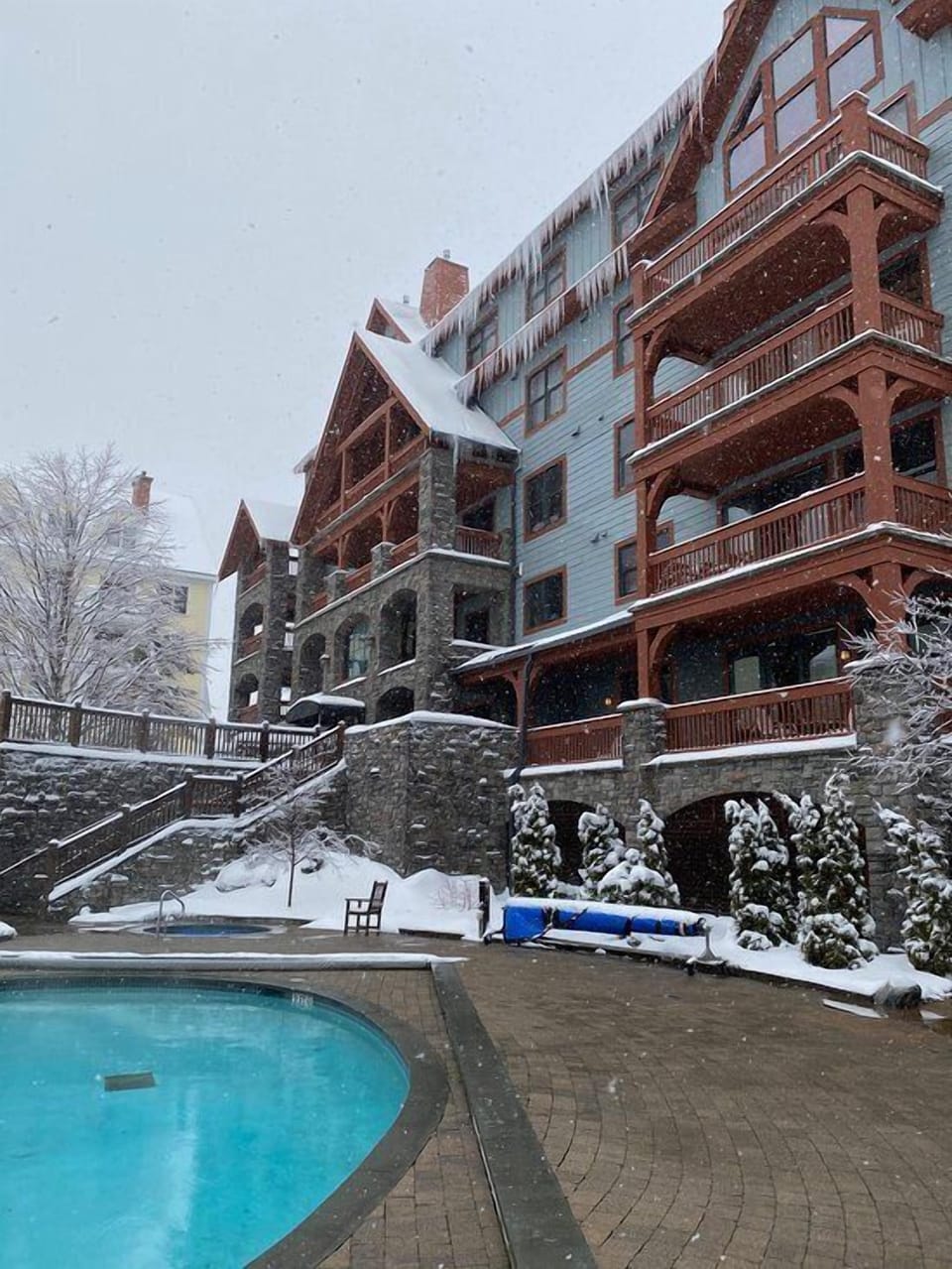 Snow-dusted exterior promising a welcoming mountain escape.