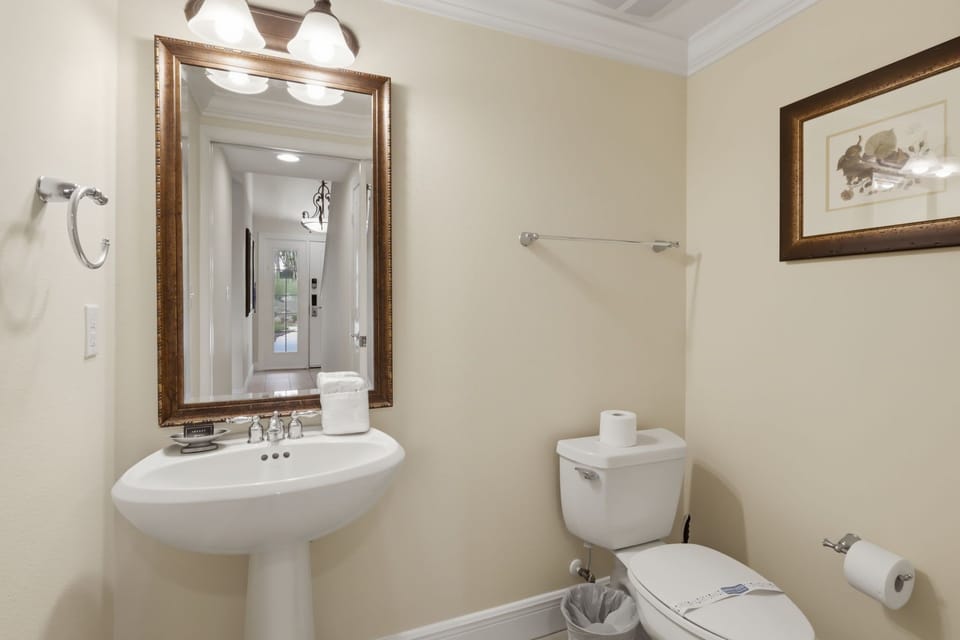 A bright private bathroom provides added convenience and privacy for guests.