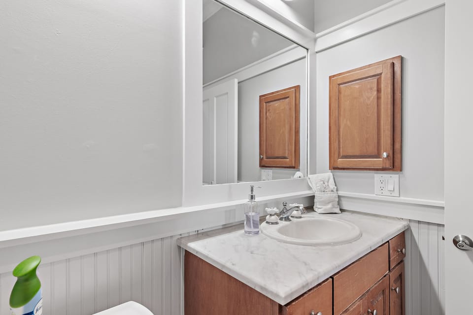 Frangista Sunset's 2nd Floor Bedroom 3: KING bed, full bathroom in hall with walk in shower, balcony overlooking Frangista Beach neighborhood, Smart TV (Sleeps 2)
