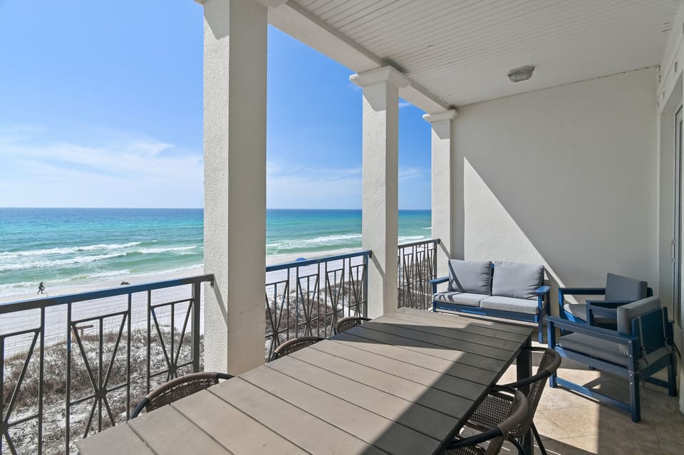 Frangista Sunset's main living area patio has a large dining table and comfortable lounge furniture - perfect for dining, morning coffee, or a cold afternoon beverage!