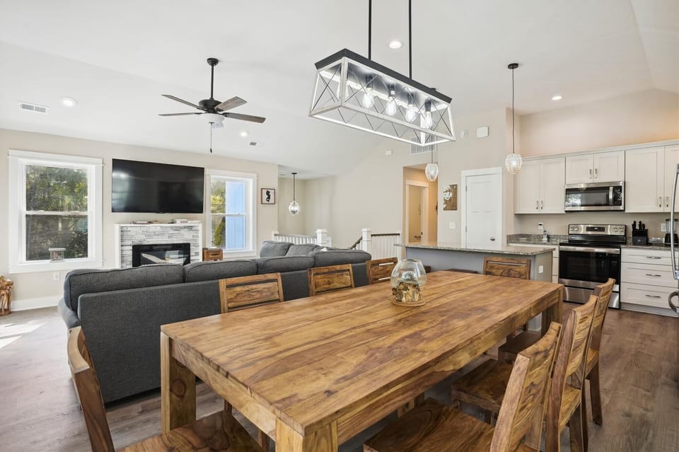 Dining area with a view of living room and kitchen