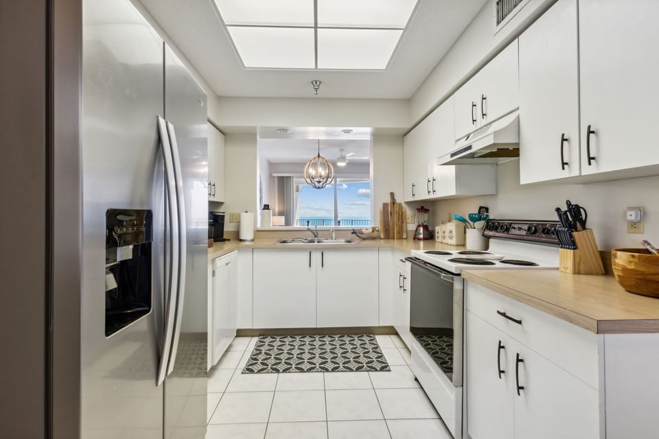 Fully equipped kitchen with appliances—ideal for extended stays and family meals.