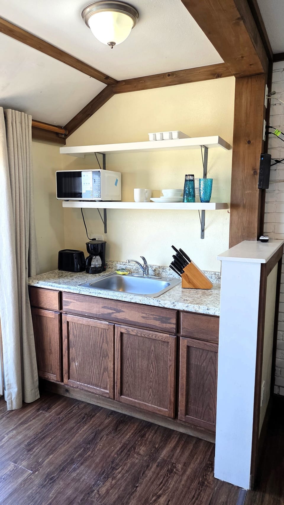Basic cookware, dish soap, and paper products are included.