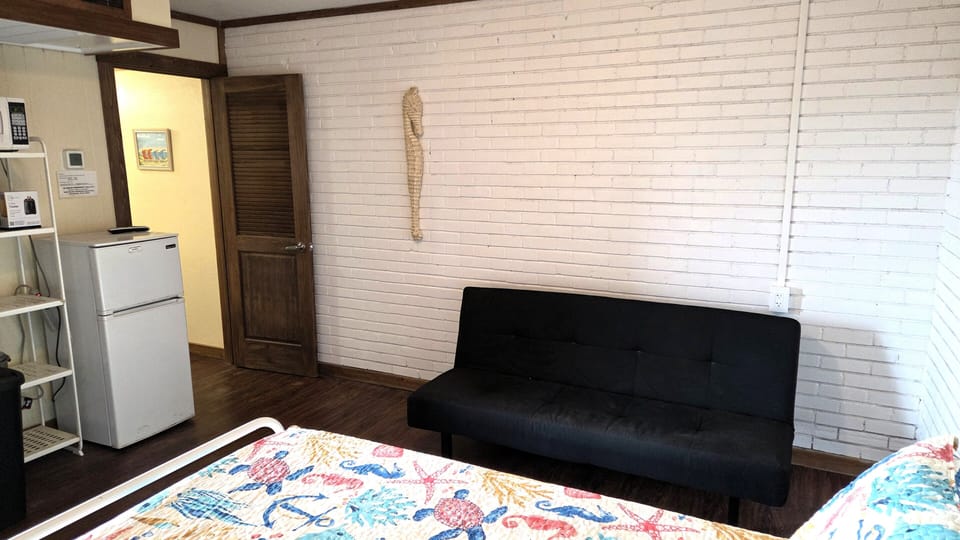 The futon sleeps up to 2 small children
