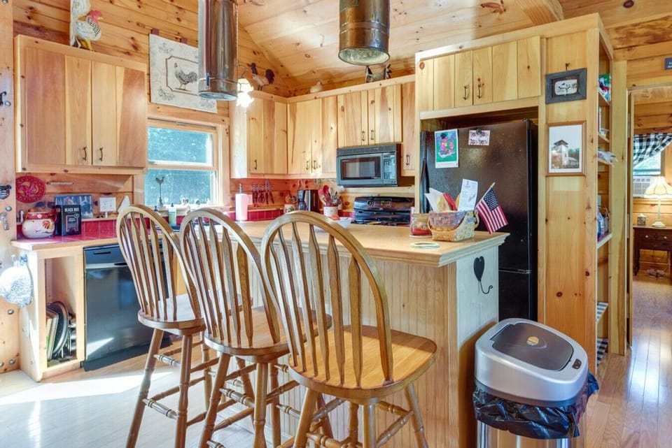 Rustic kitchen with breakfast bar and bar seating
