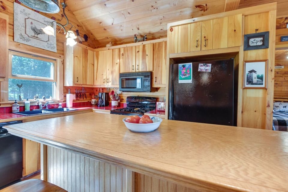 Kitchen island with prep space and full-size refrigerator