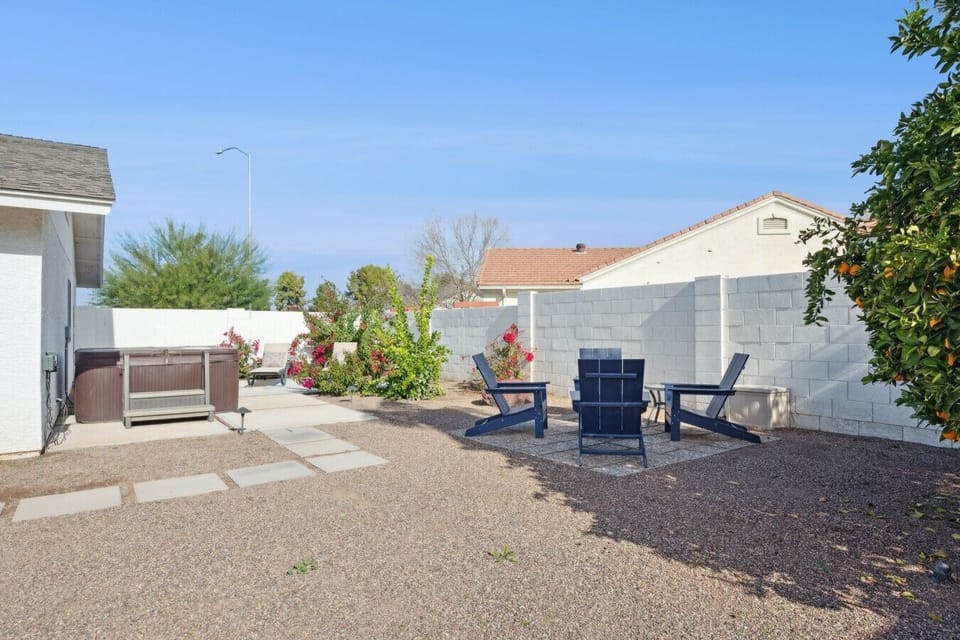 Property`s Backyard with a hot tub