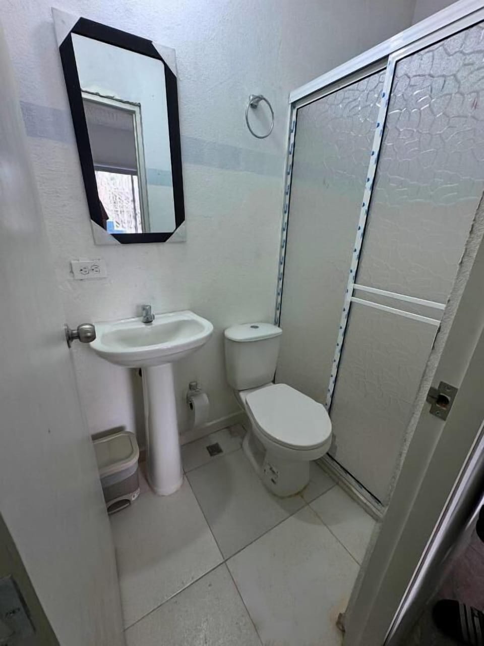 Shower, towels, soap, toilet paper