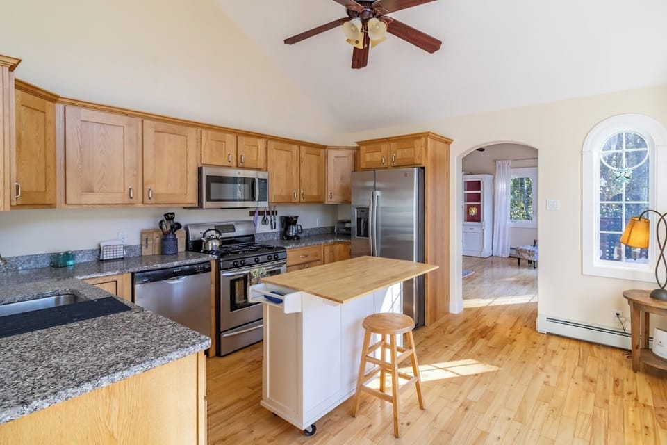 Kitchen leads to living room
