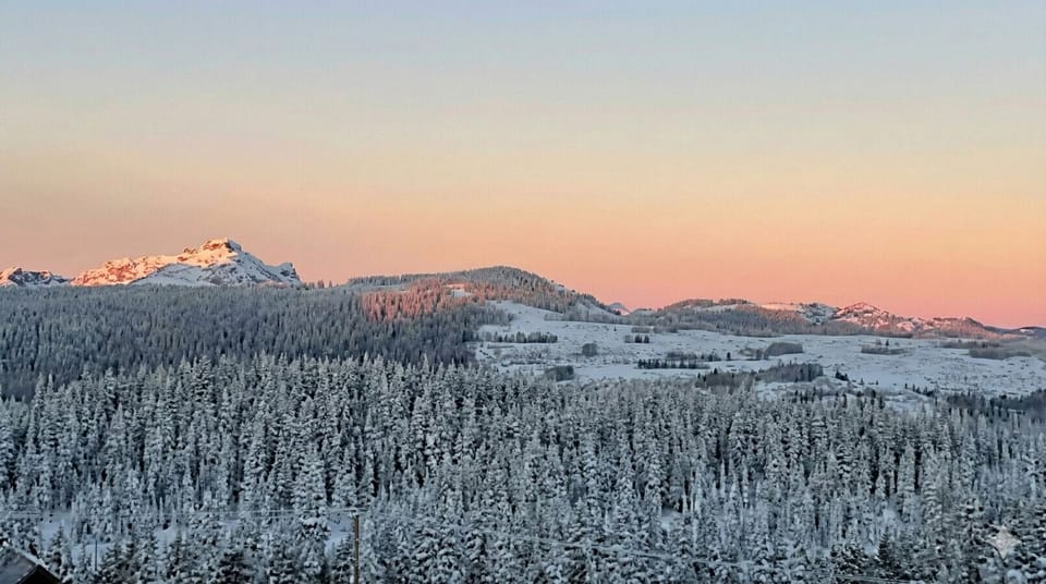 Stunning top-floor sunset views over the mountain.