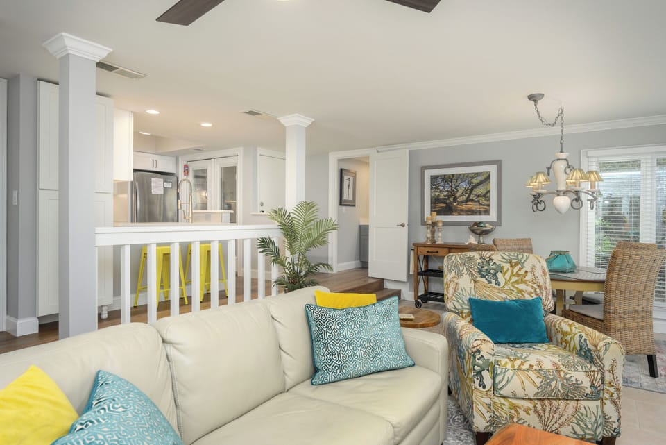 Living area with flatscreen tv and a pullout couch.