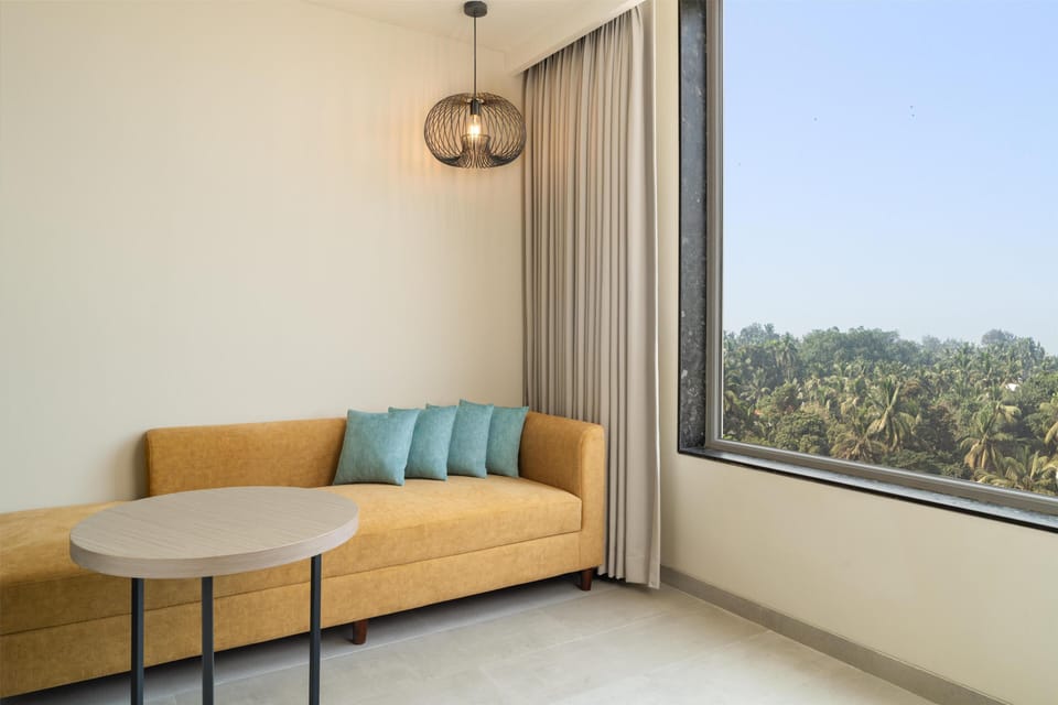 Deluxe Room, 1 King Bed | Living area | 55-inch Smart TV with satellite channels, Netflix, streaming services