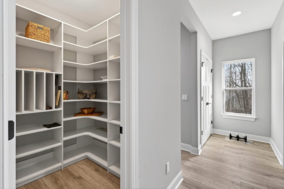 Garage entry, mud room, laundry room, and powder room