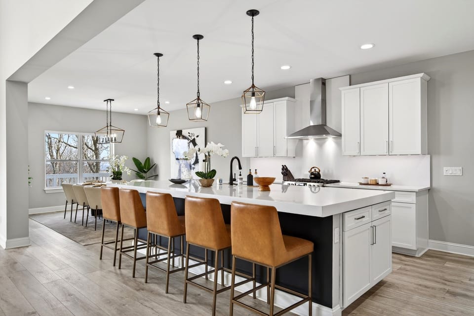 Beautifully equipped kitchen with spacious island, gas range, dishwasher, and combination drip-style and Keurig coffee maker