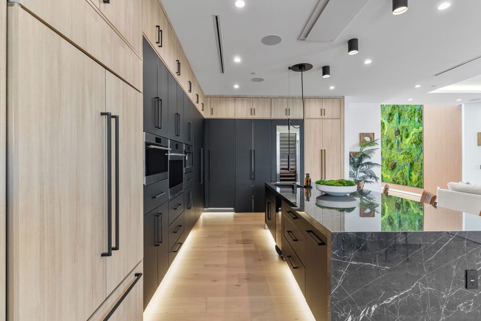 Chef's Kitchen with Wolf and Sub Zero Appliances, Hidden Wet Bar and Butler's Kitchen