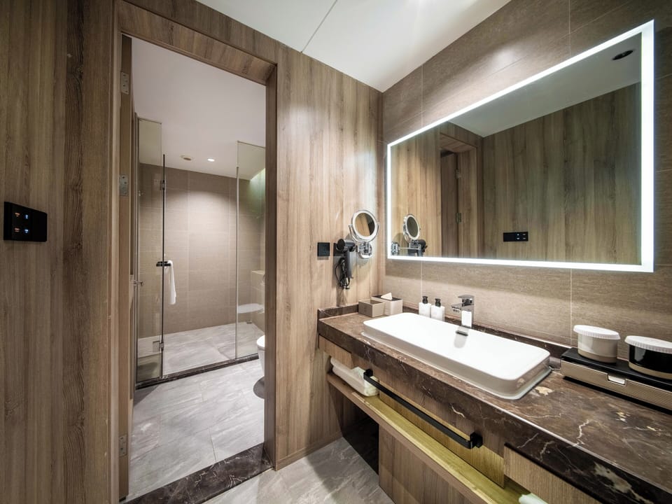 Executive Double Room | Desk, laptop workspace, blackout drapes, iron/ironing board