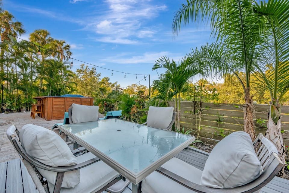 Outdoor dining table with tropical garden views