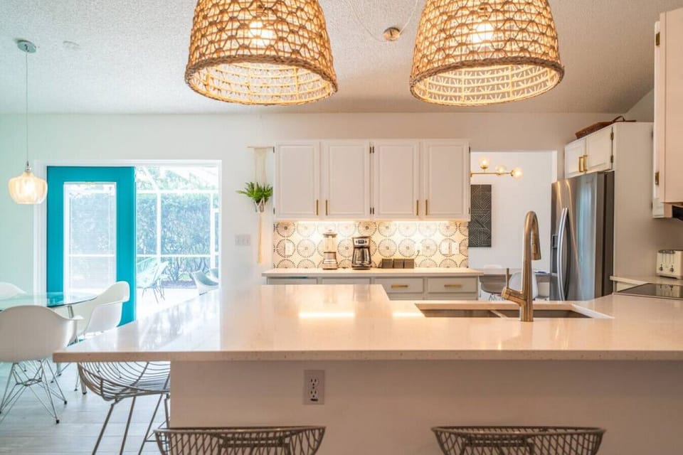 Kitchen, with direct access to the outdoor dining area.