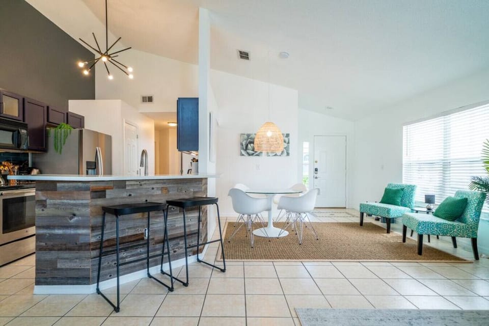Entry area with kitchen bar seating.