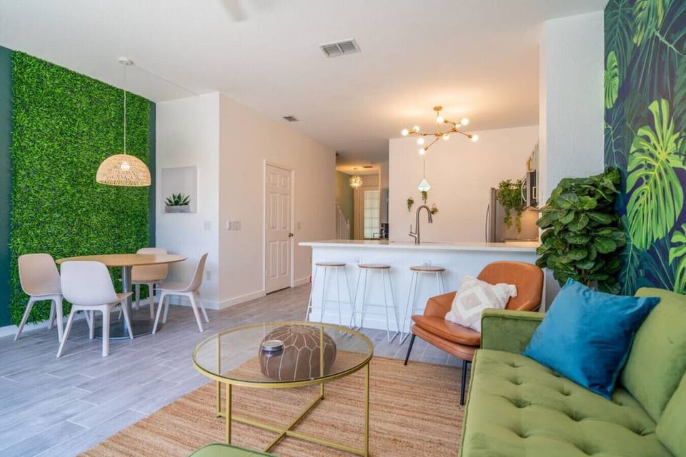 Living room with direct pool access.