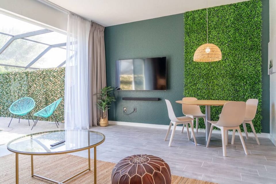 Green wall dining area.