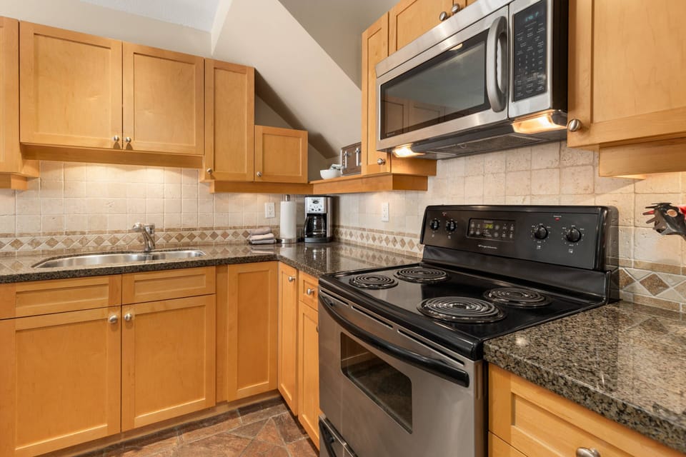 Kitchen fully stocked with cookware ready for your stay