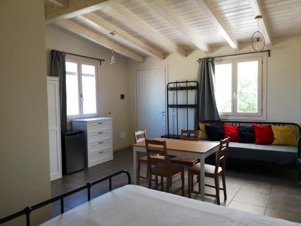 Junior Quadruple Room, Patio, Garden View | Interior