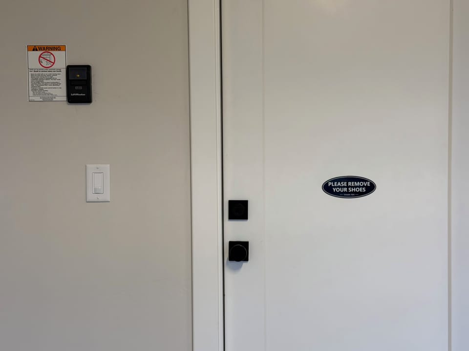 Door from garage. Please remove your shoes as you move throughout the home.