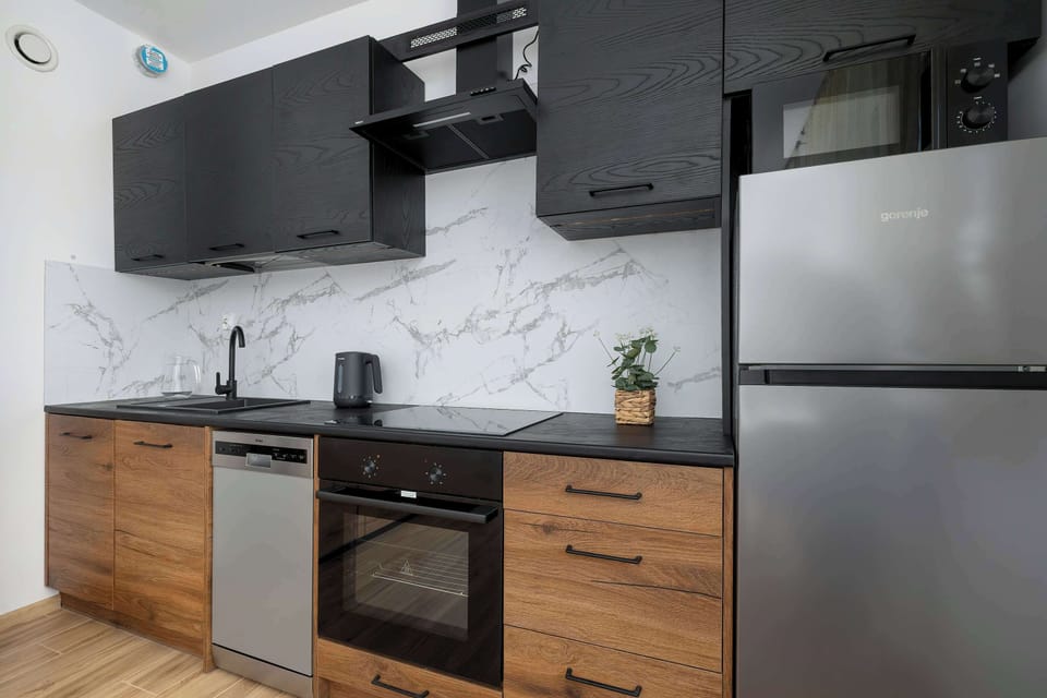 The fully equipped kitchenette includes everything you need for a home-cooked meal.