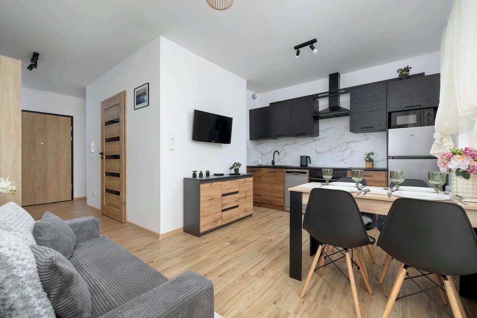 The living room offers a perfect blend of comfort and modern style.