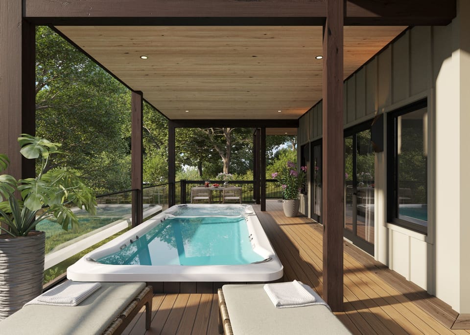 A serene covered deck complete with a private swim spa and tranquil greenery.