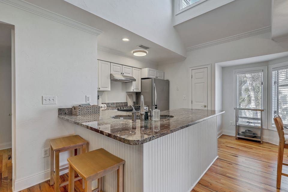 Start your day at the sleek granite breakfast bar.