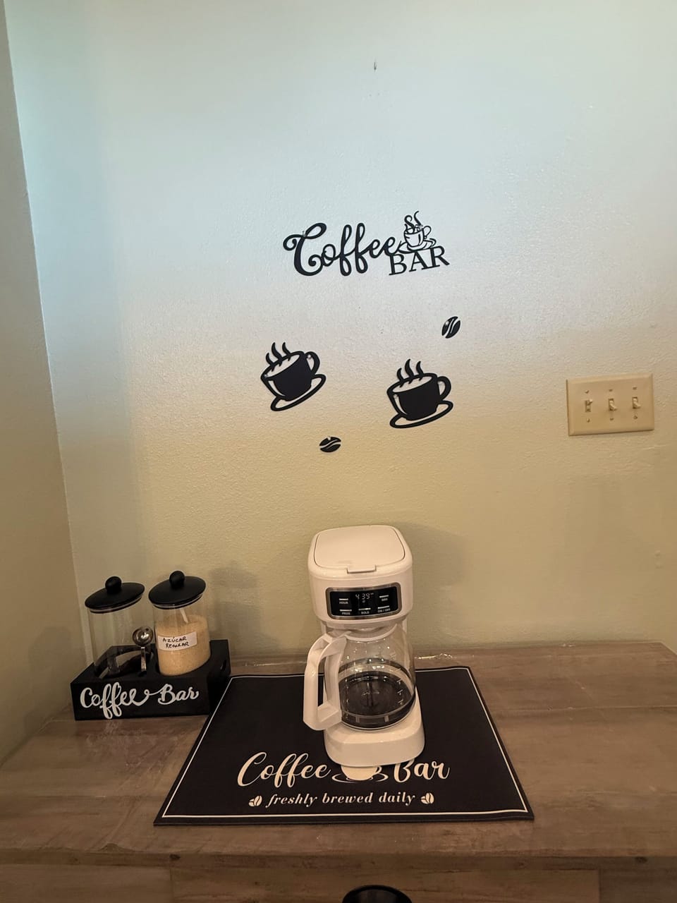 Free coffee and sugar at the coffee bar. enjoy a fresh cup of coffee or tea 