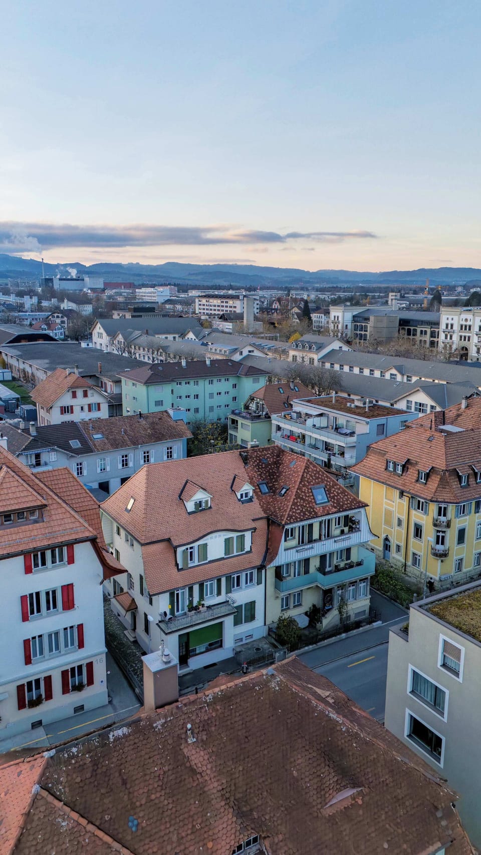 Rooftop view across Thun and the surrounding mountains
