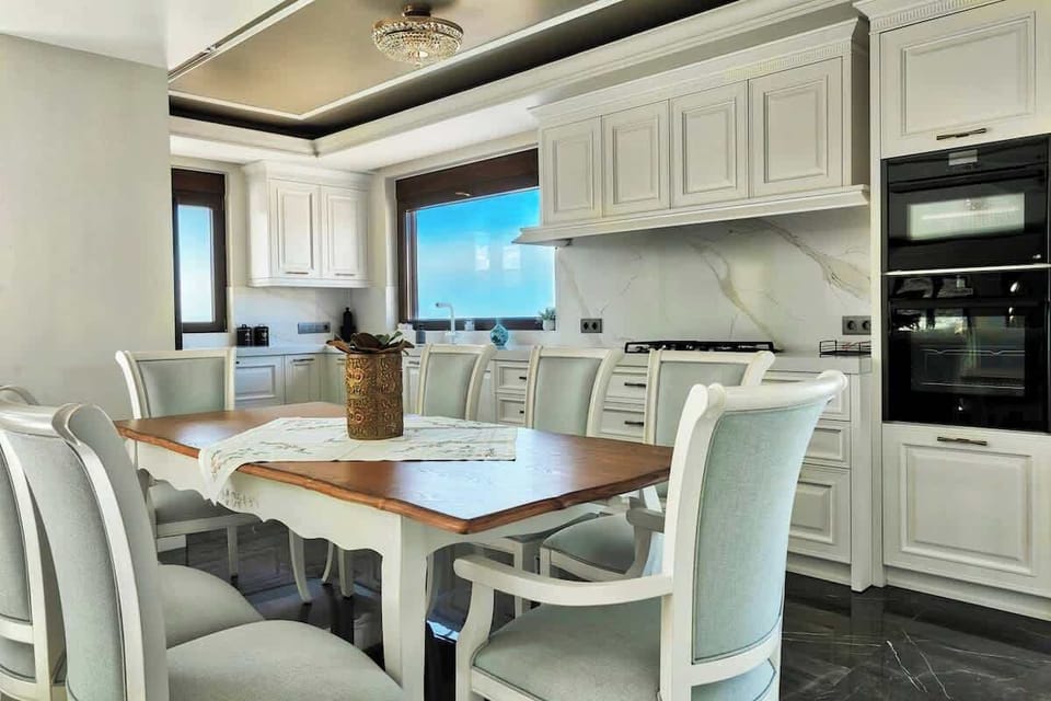 Enjoy some bright meals in this wonderful kitchen