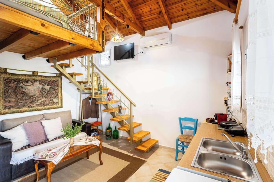 Open-plan living areawith stairs to the sleaping area