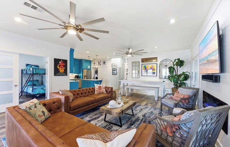 Living area with inviting seating and coastal modern decor